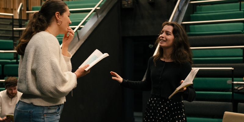 Students rehearsing a theatre script in the Scenic Stage Theatre